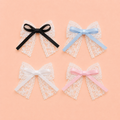 Spetsrosetter med hårspänne – 4-pack