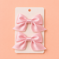 Satinrosetter med hårspänne – Blush Pink (2-pack)